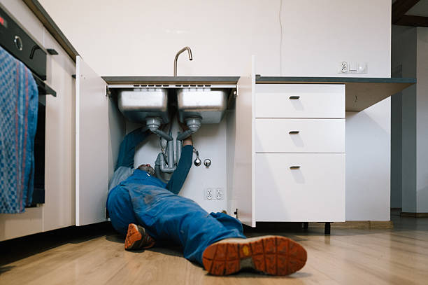 Professional Drain Cleaning technician working in Rockaway Park, NY